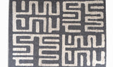 Flatweave Area rug with geometric pattern in while and dark grey colors