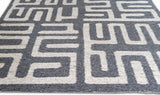 Flatweave Area rug with geometric pattern in while and dark grey colors