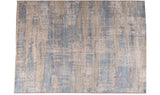 Living room Area rug with subtle patterns in blue and brown colors