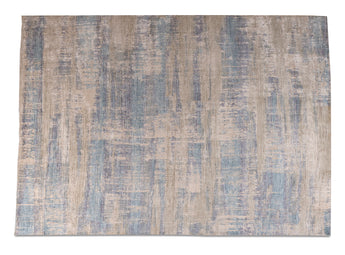 Living room Area rug with subtle patterns in blue and brown colors