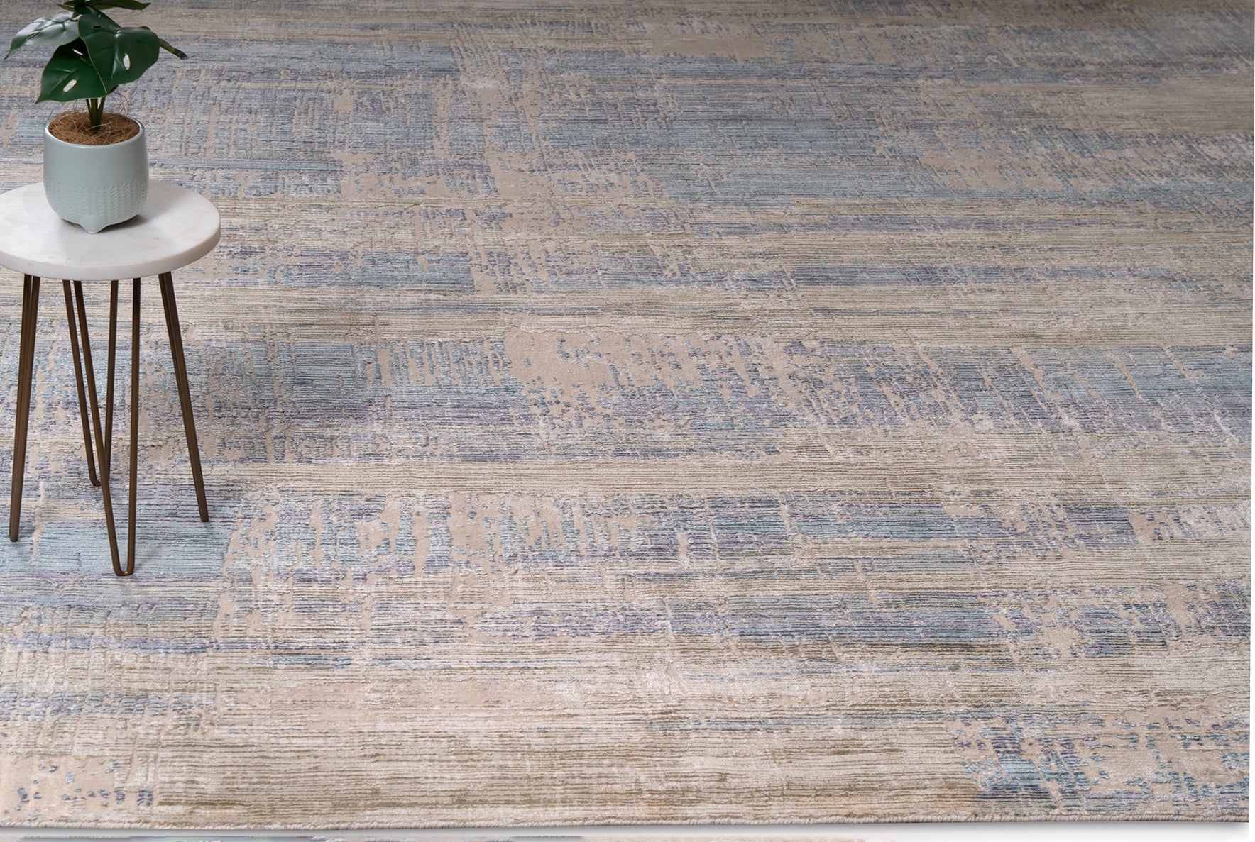 Living room Area rug with subtle patterns in blue and brown colors