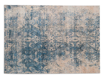 midcentury modern rug with intricate patterns in dark blur and light gold colors