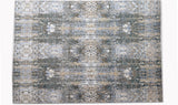 rug with intricate pattern in blue, grey and brown shades - full size view