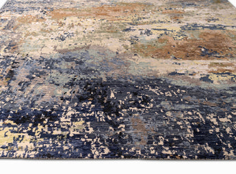 Modern Area rug with intricate patterns in multiple colors including blue, gold, rust and yellow