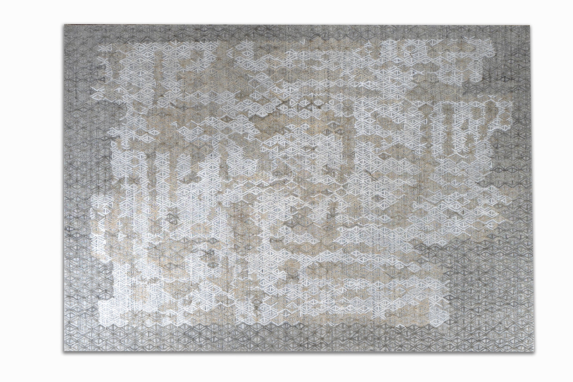 handmade are rug with simple patterns in grey and white colors