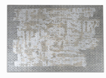 handmade are rug with simple patterns in grey and white colors