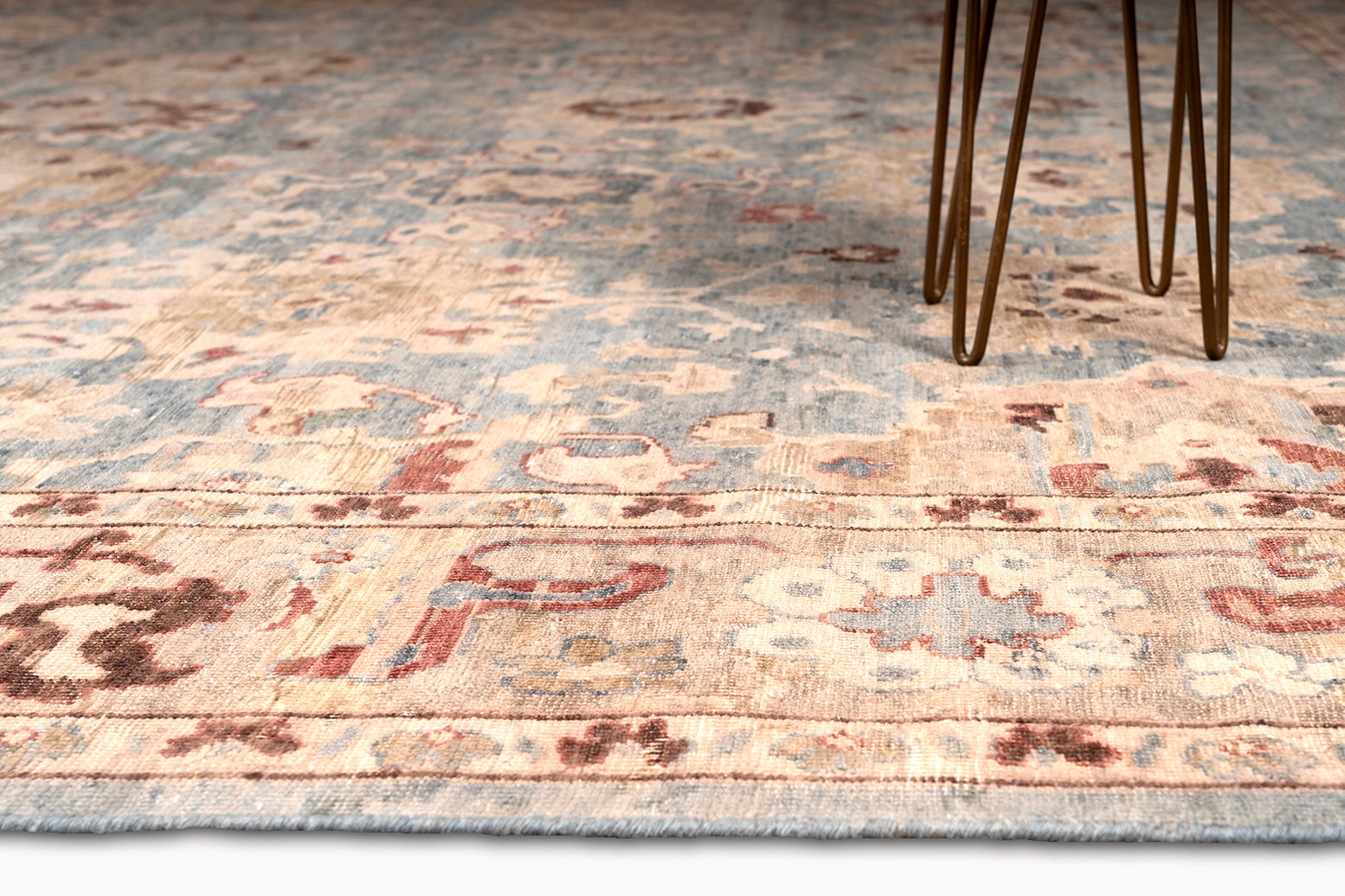 traditional are rug with floral patterns and multiple colors