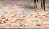 traditional are rug with floral patterns and multiple colors