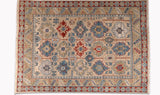 traditional area rug with patterns in blue, red and brown colors - full size view