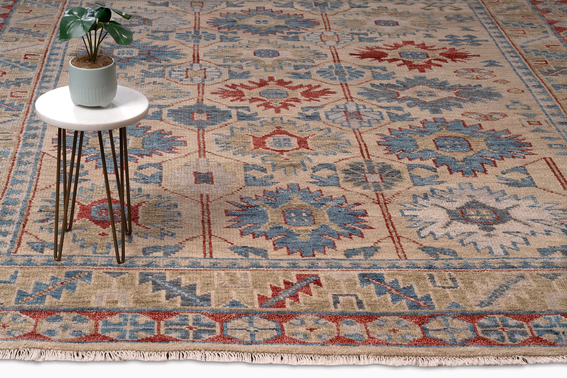 traditional area rug with blue, red and brown patterns