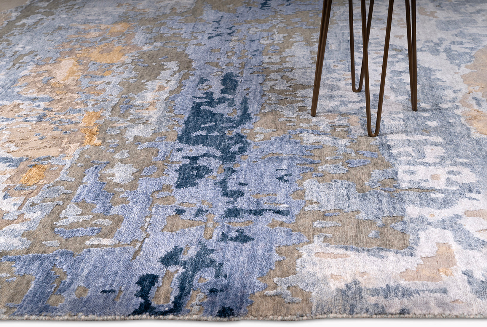 modern area rug with weave patterns in blue, white and beige colors