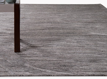 Solid Dark grey rug with line designs, made of wool