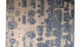 push rug with beige base and bulging patterns in blue color