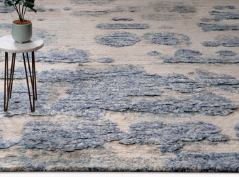 push rug with beige base and bulging patterns in blue color