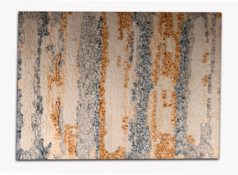 Plush area rug with bulging patterns in rust , blue and white colors